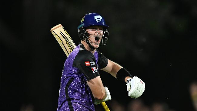 HOBART, AUSTRALIA - JANUARY 27: Mitch Owen of the Hurricanes celebrates scoring a century during the BBL The Final match between Hobart Hurricanes and Sydney Thunder at Ninja Stadium on January 27, 2025 in Hobart, Australia. (Photo by Steve Bell/Getty Images)