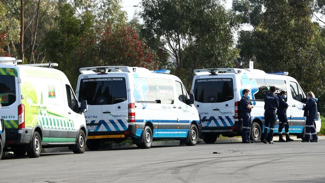 Medical transport is lined up the Epping Gardens aged care home amid the coronavirus crisis. Picture: Getty Images