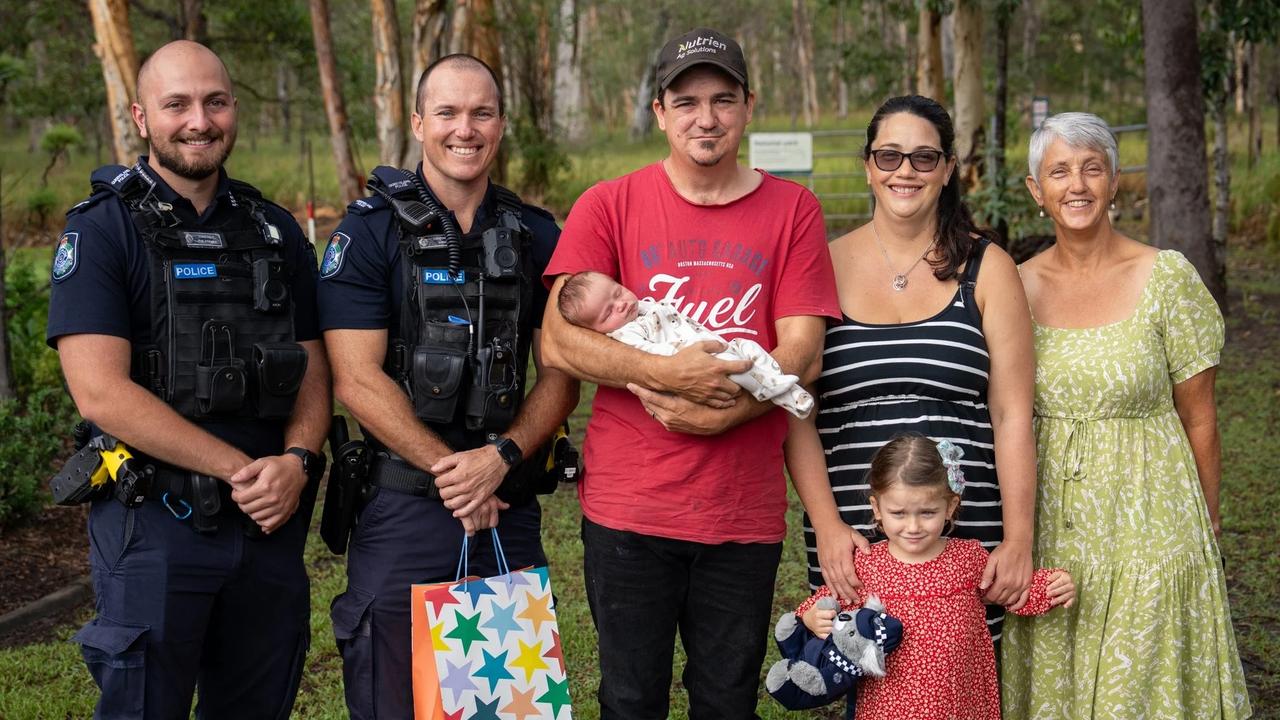 Constables ﻿Philippe Stigner and Jacob Pennisi with Nathaniel and Julie Pedler and their two children, baby Blake and Heidi.