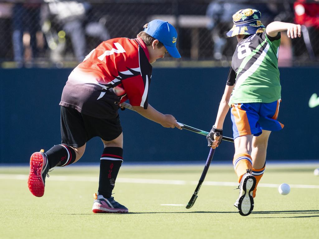 Past High player Lincoln Kahler (left) against Newtown Norths Tigers in under-11 boys Presidents Cup hockey at Clyde Park, Saturday, May 27, 2023. Picture: Kevin Farmer