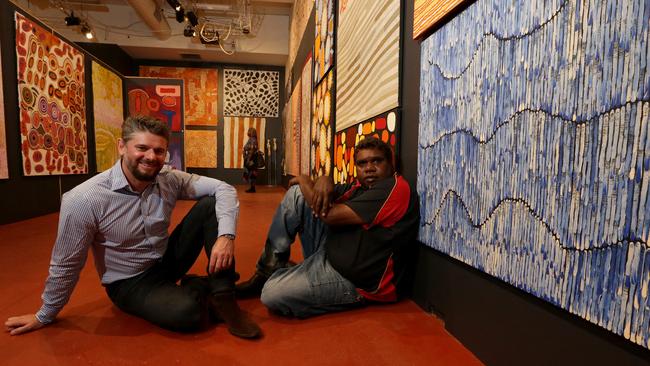 Former Art Gallery of SA director Nick Mitzevich with artist Joseph Zimran at the Tarnanthi Art Fair in 2015.