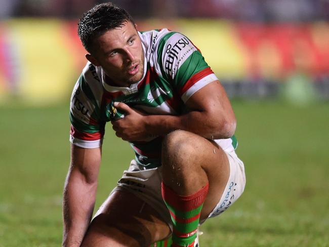 Sam Burgess rests on the field against the Sea Eagles.