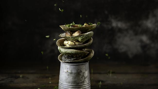 Analiese Gregory, baby abalone, shiitake and black garlic, grilled over fire. Winter Feast stallholder 2025. Picture: Dearna Bond/Dark Mofo