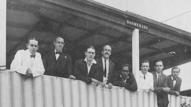 Duke Kahanamoku (slouching, centre) at Boomerang Camp at Freshwater in January 1915. Northern Beaches Library