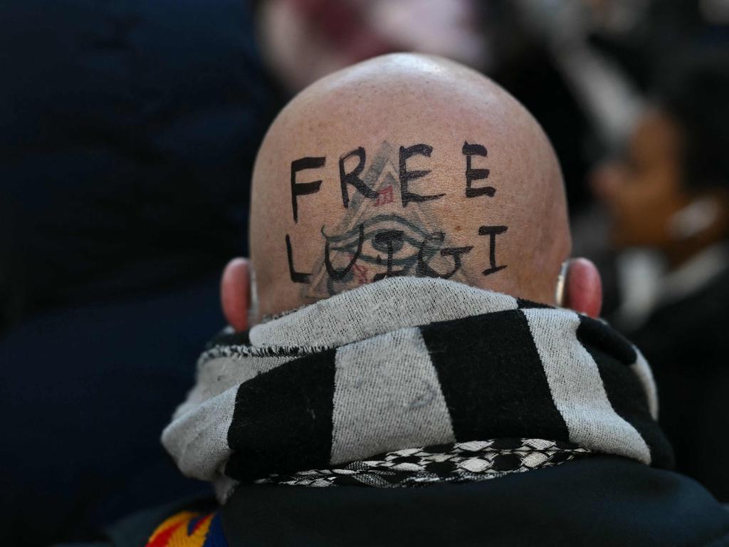 A male supporter calling for Luigi Mangione to be freed. Picture: Angela Weiss / AFP