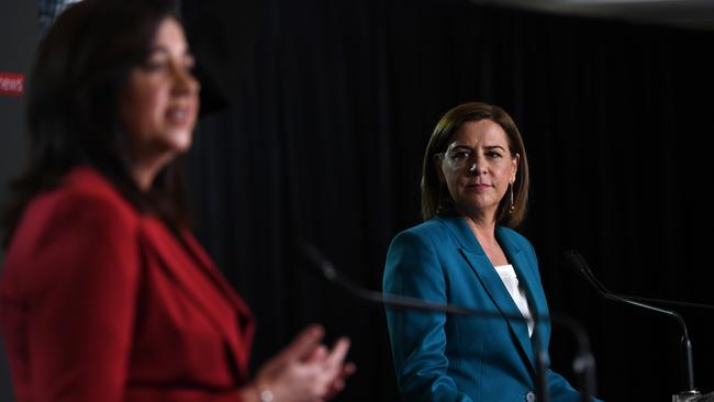 BRISBANE, AUSTRALIA - NewsWire Photos - OCTOBER 28, 2020. Queensland Premier Annastacia Palaszczuk (left) and opposition Leader Deb Frecklington engage in a debate during the Sky News - Courier Mail People's Forum at the Broncos Leagues club in Brisbane, ahead of the October 31 state election. Picture: NCA NewsWire / Dan Peled