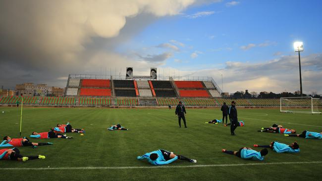 Players warm down after a training session ahead of the Socceroos World Cup qualifier against Iraq in Tehran, Iran. Pic: Mark Evans