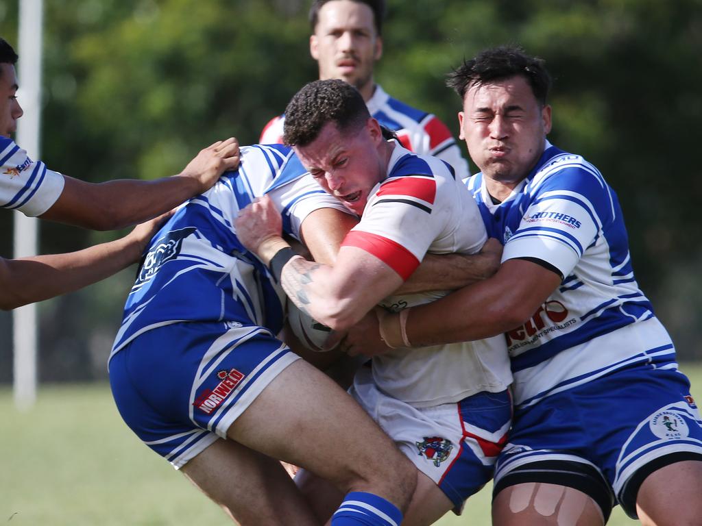 Ivanhoes' Dallas Skardon is wrapped up by the Brothers defence in the Cairns District Rugby League (CDRL) Round 16 match between the Ivanhoe Knights and Cairns Brothers, held at the Smithfield Sporting Complex. Picture: Brendan Radke