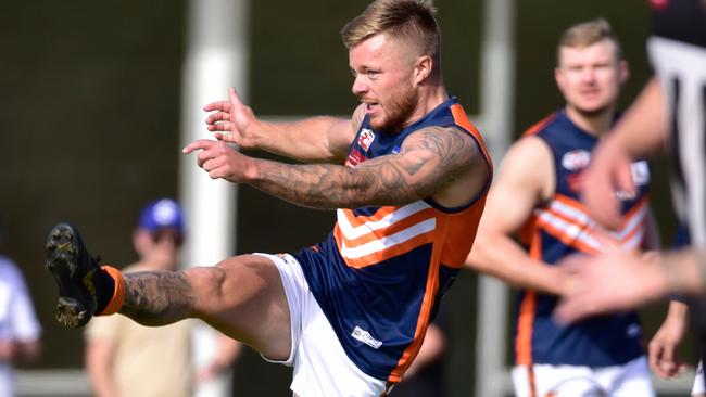 Adam Sullivan gets a kick away for the Bears. Picture: Jamie Morey