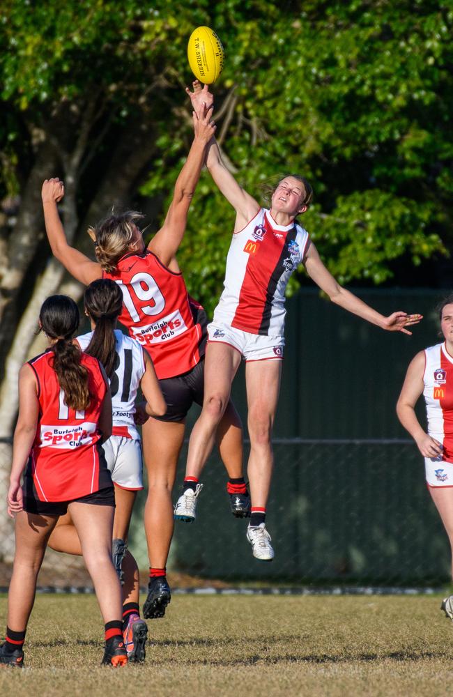 Harlee McIlwain rucks against Burleigh AFC.