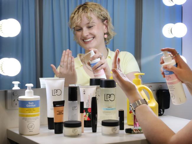 Makeup and Sun skin protection. Grace Baldwin applying sun screen before heading out into the sun.                        Picture: David Caird