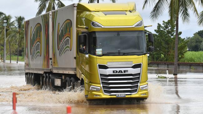 Flooding at Plantation Creek in Ayr cuts Bruce Highway to traffic apart from trucks. Picture: Evan Morgan