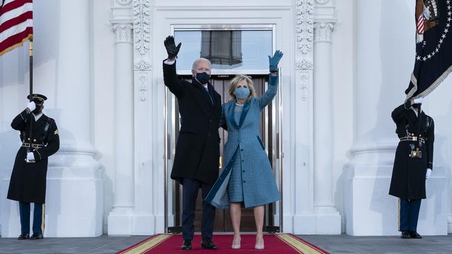 President Joe Biden and first lady Dr. Jill Biden wave as they arrive at the North Portico of the White House. Picture: Alex Brandon-Pool/Getty Images