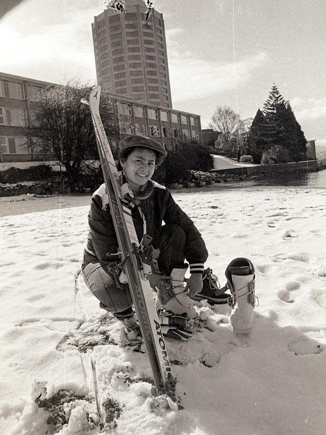 Jill Alexander gets ready to try out her skis on the beach near Wrest Point Casino.