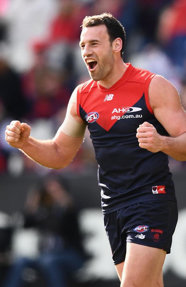 Cameron Pedersen of the Demons celebrates kicking a goal. (Photo by Quinn Rooney/Getty Images)