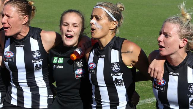 Moana Hope (second from the right) celebrates with her former teammates after the Round 7 AFLW match between Collingwood and the Adelaide Crows at Olympic Park Oval on March 18. Picture: AAP Image/Hamish Blair