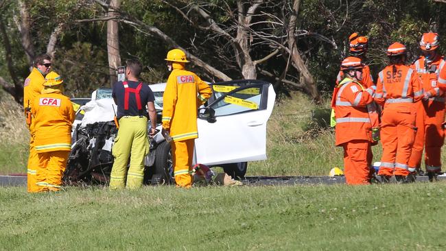 Emergency services at the scene of a road fatality in Portarlington on Friday. Picture: Mark Wilson