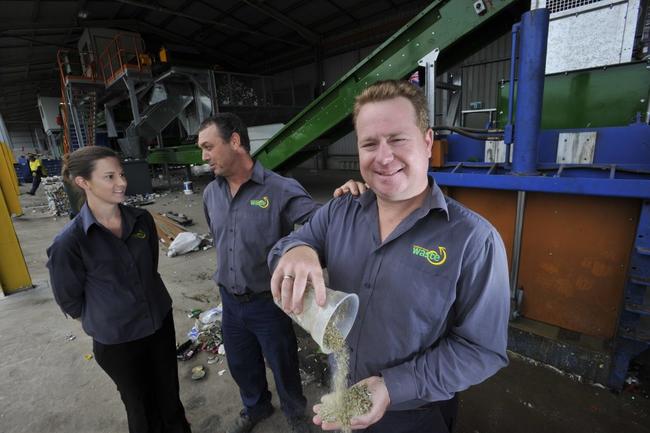 Lismore Recycling & Recovery Centre waste operations co-ordinator Kevin Trustum, waste education officer Danielle Hanigan and consumer resources supervisor Charlie Crethar at the new MRF recycling machine which separates waste and turns glass bottles into sand for roads. Photo Marc Stapelberg / The Northern Star. Picture: Marc Stapelberg