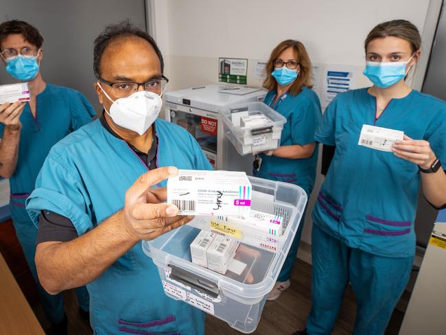 GPS are pleading with the Federal Government to indemnify them against giving the Astrazeneca vaccine to those aged under 60 as they warn thousands of batches are about to expire. Dr Mukesh Haikerwal pictured his crew at the Altona North Respiratory Clinic Ryan Mitchell, Jenny Klenidis and Chloe Coffin. Picture: Mark Stewart