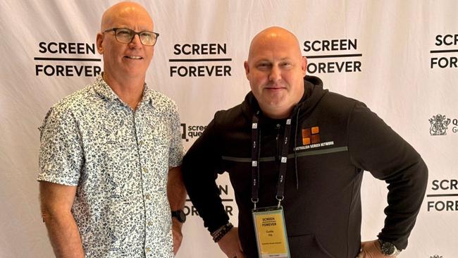 Curtis Pitt (right) with author Paul MacNamara. Photo: LinkedIn.