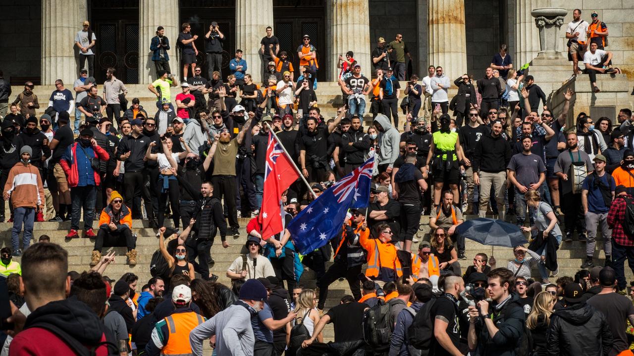 Protesters have taken to the streets following the Andrews government’s decision to make the Covid-19 vaccine mandatory for workers in the construction sector. Picture: Darrian Traynor/Getty Images