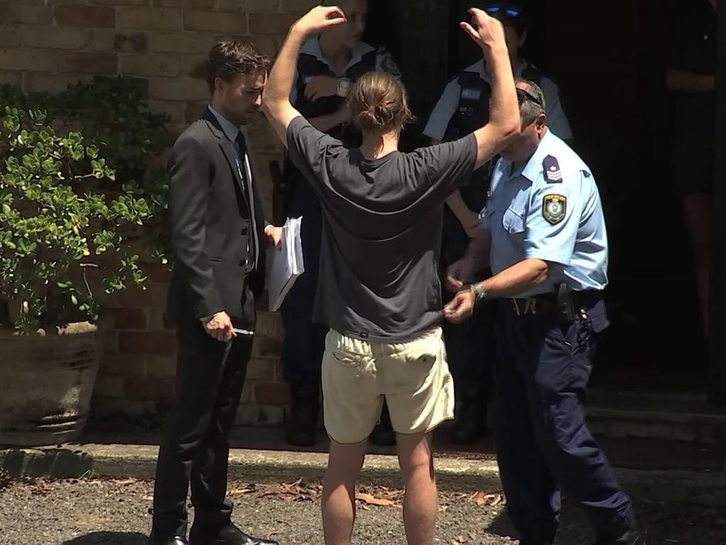 One of the men is searched by NSW Police. 