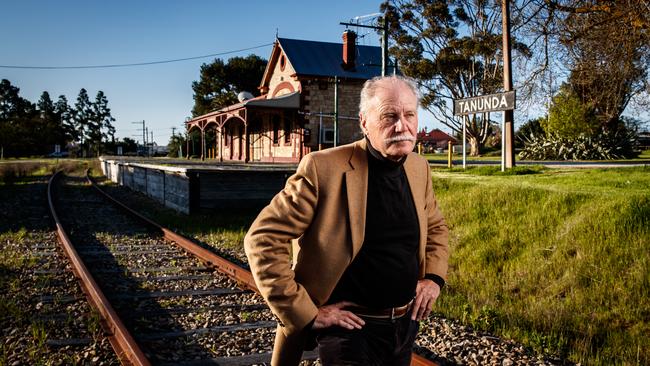 John Geber on the railway tracks at Chateau Tanunda. Mr Geber owns Chateau Tanunda and wants to bring back the Barossa Wine Train. Picture: Matt Turner