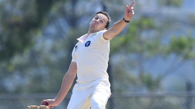 Mark Stafford bends his back for Melbourne University. Picture: Julian Smith