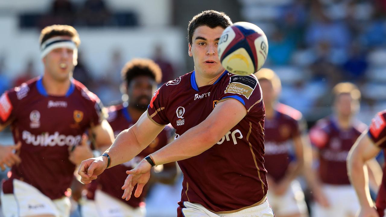 Alex Horan in action during a clash between University of Queensland and Sunnybank.