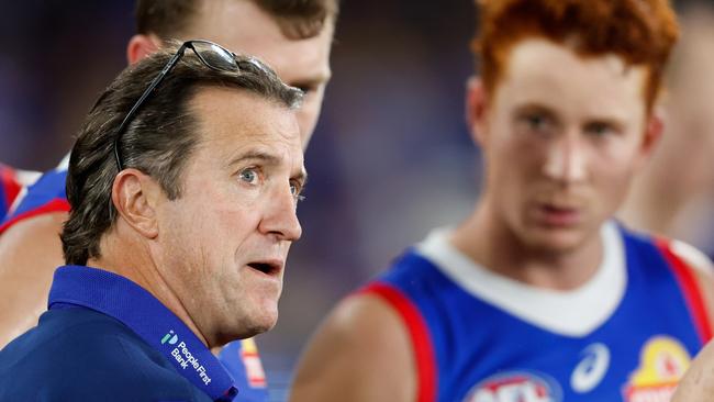 MELBOURNE, AUSTRALIA - MAY 05: Luke Beveridge, Senior Coach of the Bulldogs addresses his players at three quarter time during the 2024 AFL Round 08 match between the Western Bulldogs and the Hawthorn Hawks at Marvel Stadium on May 05, 2024 in Melbourne, Australia. (Photo by Dylan Burns/AFL Photos via Getty Images)