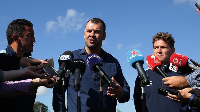 NSW Waratahs coach Daryl Gibson, Wallabies coach Michael Cheika and Waratahs captain Michael Hooper address the media on the future of Israel Folau. Picture: Brett Costello