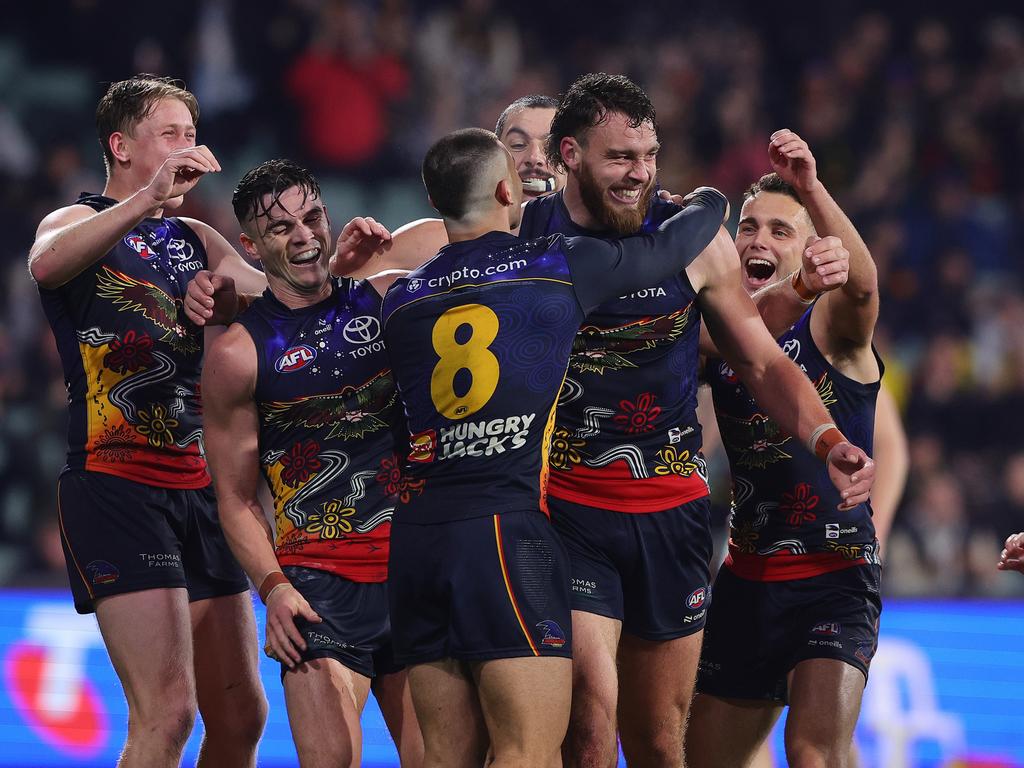 Riley Thilthorpe of the Crows celebrates a goal on return against the Saints. Picture: Sarah Reed/AFL Photos via Getty Images.