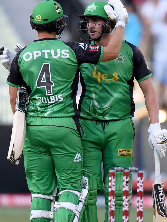 Evan Gulbis celebrates a Melbourne Stars victory with teammate Dan Worrall.