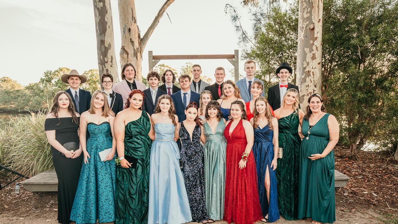 Glasshouse Christian College Year 12 Maroon pose for their class photo for the last time with their form teacher Mrs Bobbie Briggs. Picture: Jordan Bull