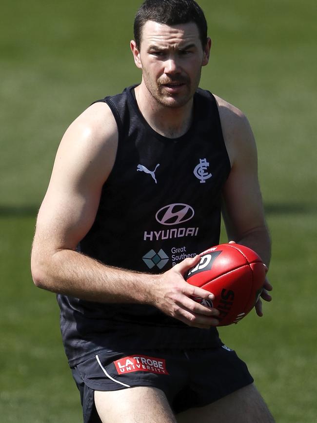 Mitch McGovern enjoys his first run. Picture: AFL Photos via Getty Images