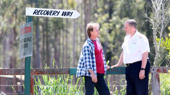 Gavin Watts, service manager at the Salvo's Dooralong rehabilitation centre with resident Steve Taylor. Picture: AAP/Sue Graham.