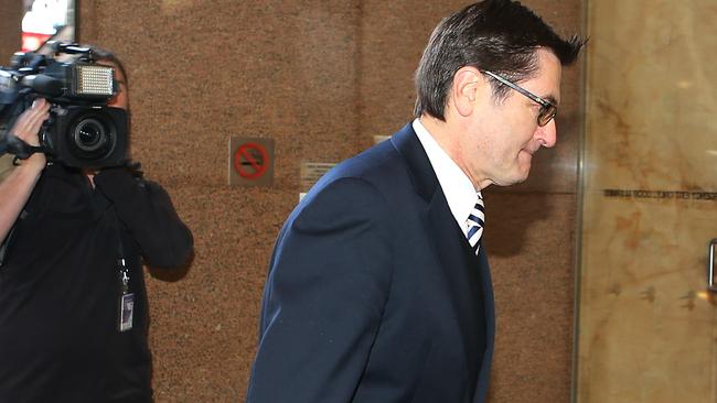 Greg Combet arrives as Bill Shorten fronts the Royal Commission into Union corruption in Sydney. Picture: John Feder.