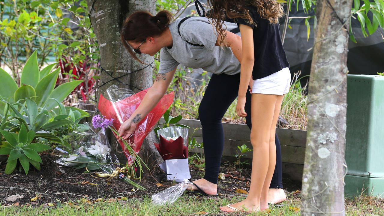 Neighbours place floral tributes after Emma Lovell’s death. Picture: David Clark.