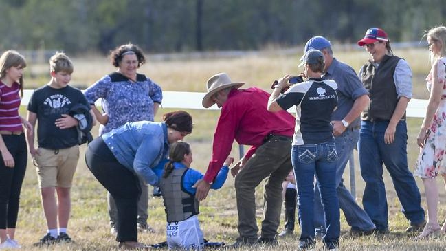 Jockeys and race officials inspect the track after Jockey Gemma Steele fell from the Andrew Suli trained Party Pardee after the third race at Calliope on Saturday 29 June 2019.