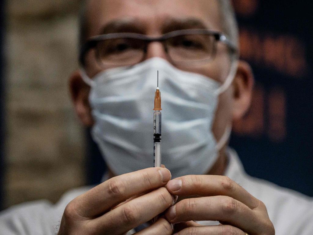 The world won’t receive COVID-19 vaccine coverage for another six years at current rates, an expert has warned. Picture: Jeff Pachoud / AFP