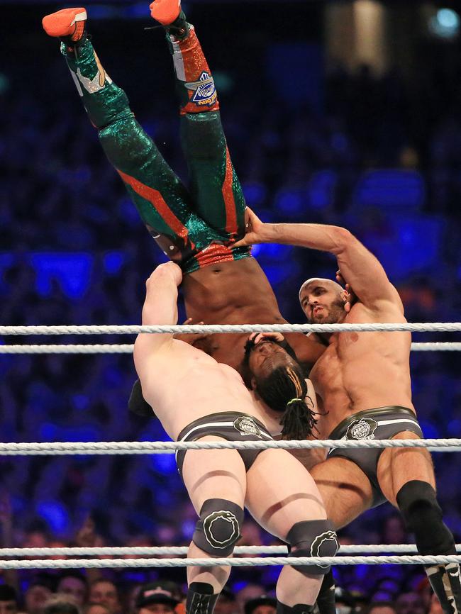 Sheamus and Cesaro send Kofi Kingston flying with a German suplex. Picture: Mark Stewart