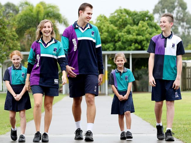 Alexis Stringfellow, year 3, Kate Fairweather, year 12, Ashley Smith, year 12, Violet O'Shea, year 2, and Zach Swensson, year 8, attend North Lakes State College which has grown to become the second biggest school in the state. Picture: Tara Croser.