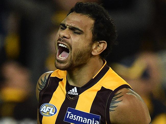 Cyril Rioli of the Hawks reacts after kicking a goal during the round 5 AFL match between the Hawthorn Hawks and Adelaide Crows at the MCG in Melbourne, Friday, April 22, 2016. (AAP Image/Julian Smith) NO ARCHIVING, EDITORIAL USE ONLY