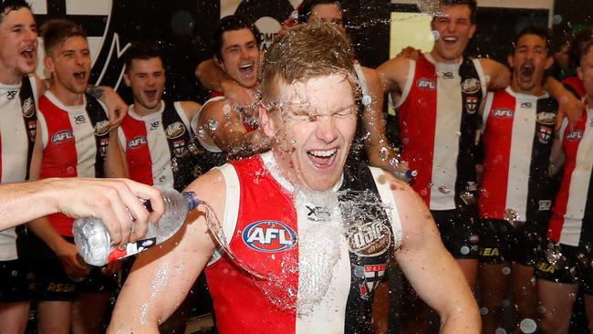 Dan Hannebery is drenched after his first win as a Saint.