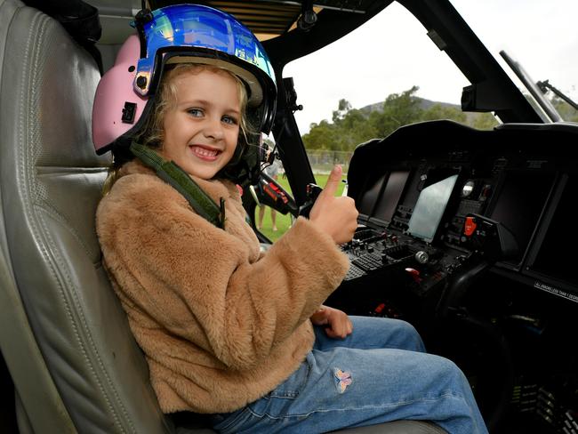 5th Aviation with Penelope Paterson, 6, sits at the controls of a Augusta Westland AW139 helicopter from 5th Aviation. Picture: Evan Morgan