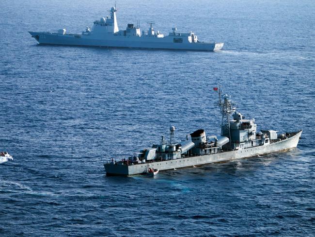 China's South Sea Fleet taking part in a drill. Naval, coastguard and fishing vessels are currently active around a sandbar in the Spratly Islands. Picture: AFP