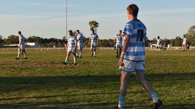 Spectators cheer on as they watch the A Grade Roma vs Condamine match at the Roma Rugby Races at Bassett Park. Picture: Chloe Cufflin.