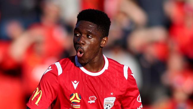 Adelaide United’s Al Hassan Toure will miss the clash against Central Coast because he is on U-23 national teak duty in China. (AAP Image/Kelly Barnes)