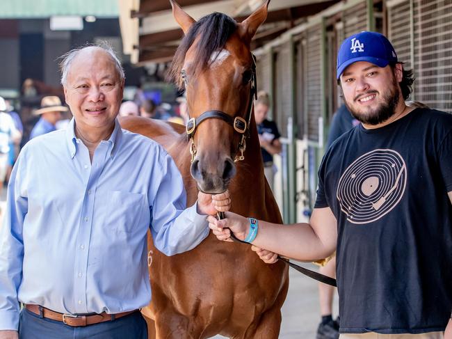 Tony Fung and son Justin at the Magic Millions sales. Picture by Luke Marsden.