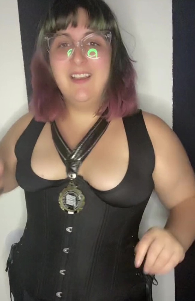 In another video, she explained she has made the dress work by adding a pair of black shorts and a corset. Picture: TikTok/girlfriendxoxoxo